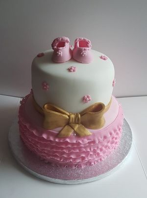 Shoes and ruffles baby shower cake
