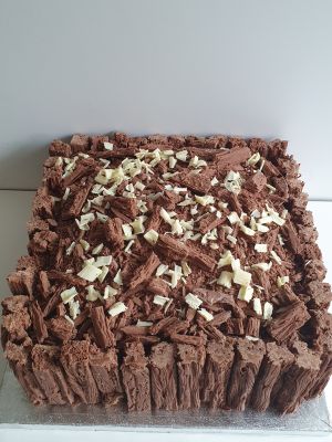 Flake edged chocolate cake