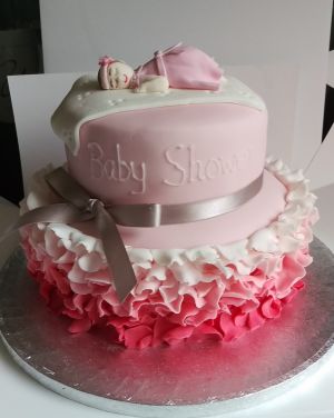 Baby & pink ruffles baby shower cake