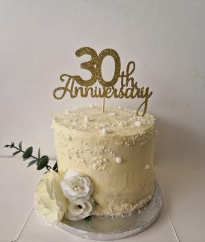 Anniversary cake with edible pearls & flowers