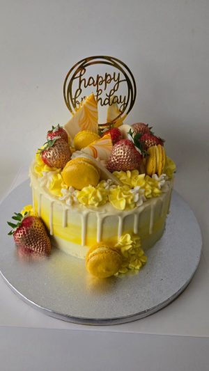 Yellow theme drip cake